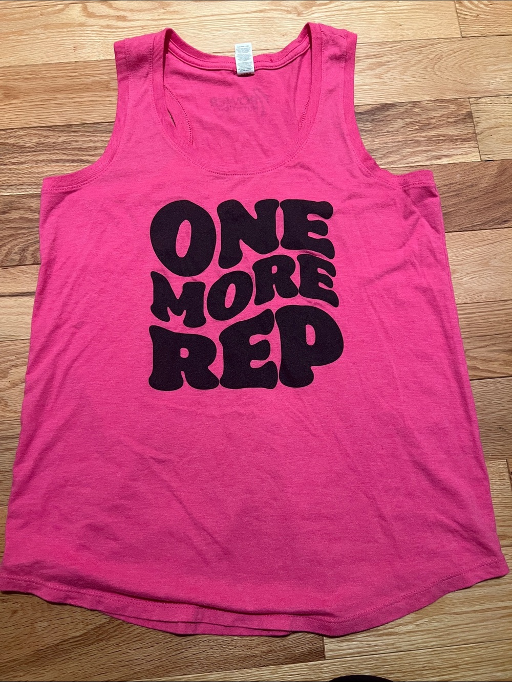 District Hot Pink Tank Top with Black 'ONE MORE REP' Graphic